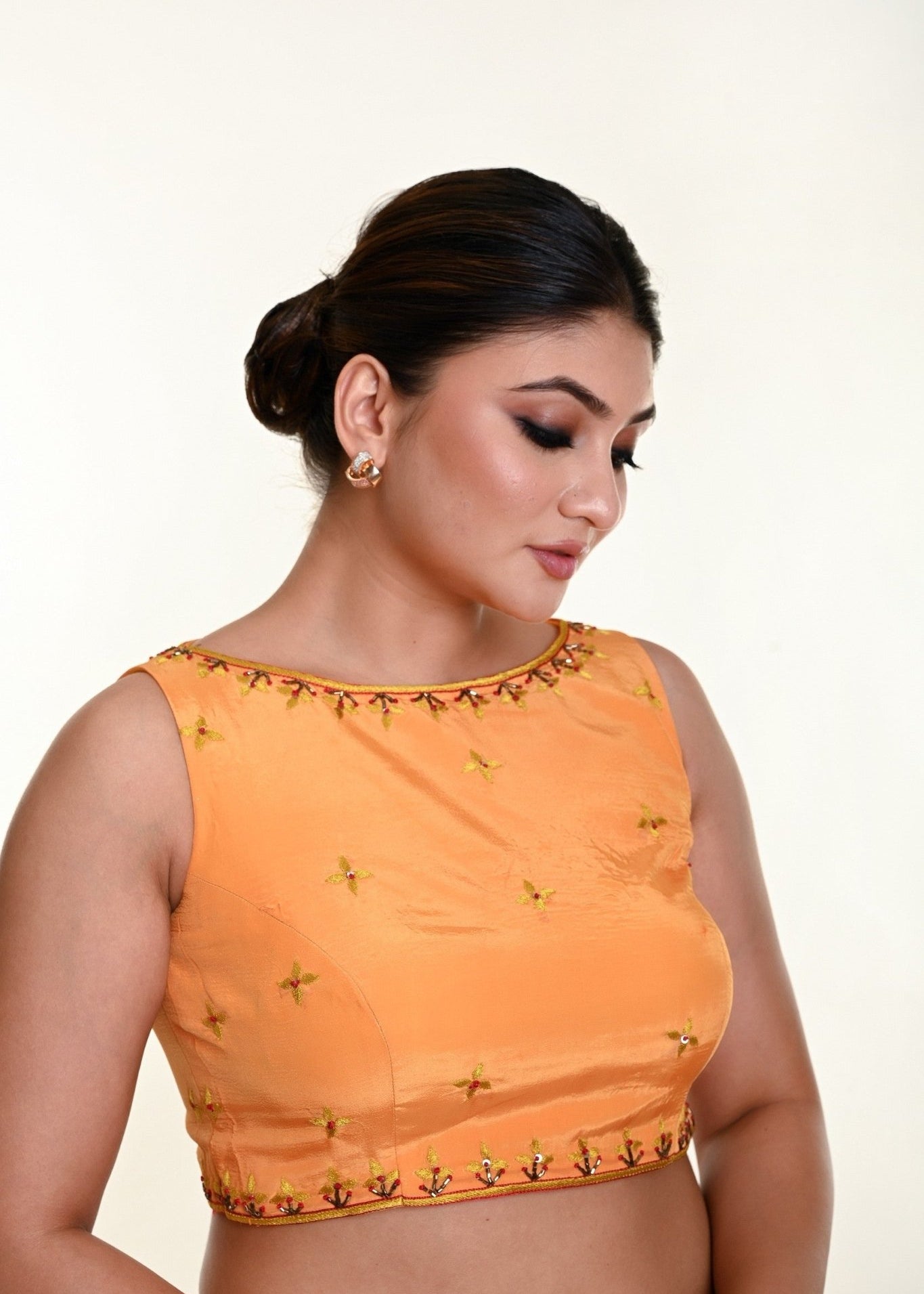 Butter Yellow Sleeveless Blouse in Crepe Silk with Hand Embroidery work - Anvi Couture