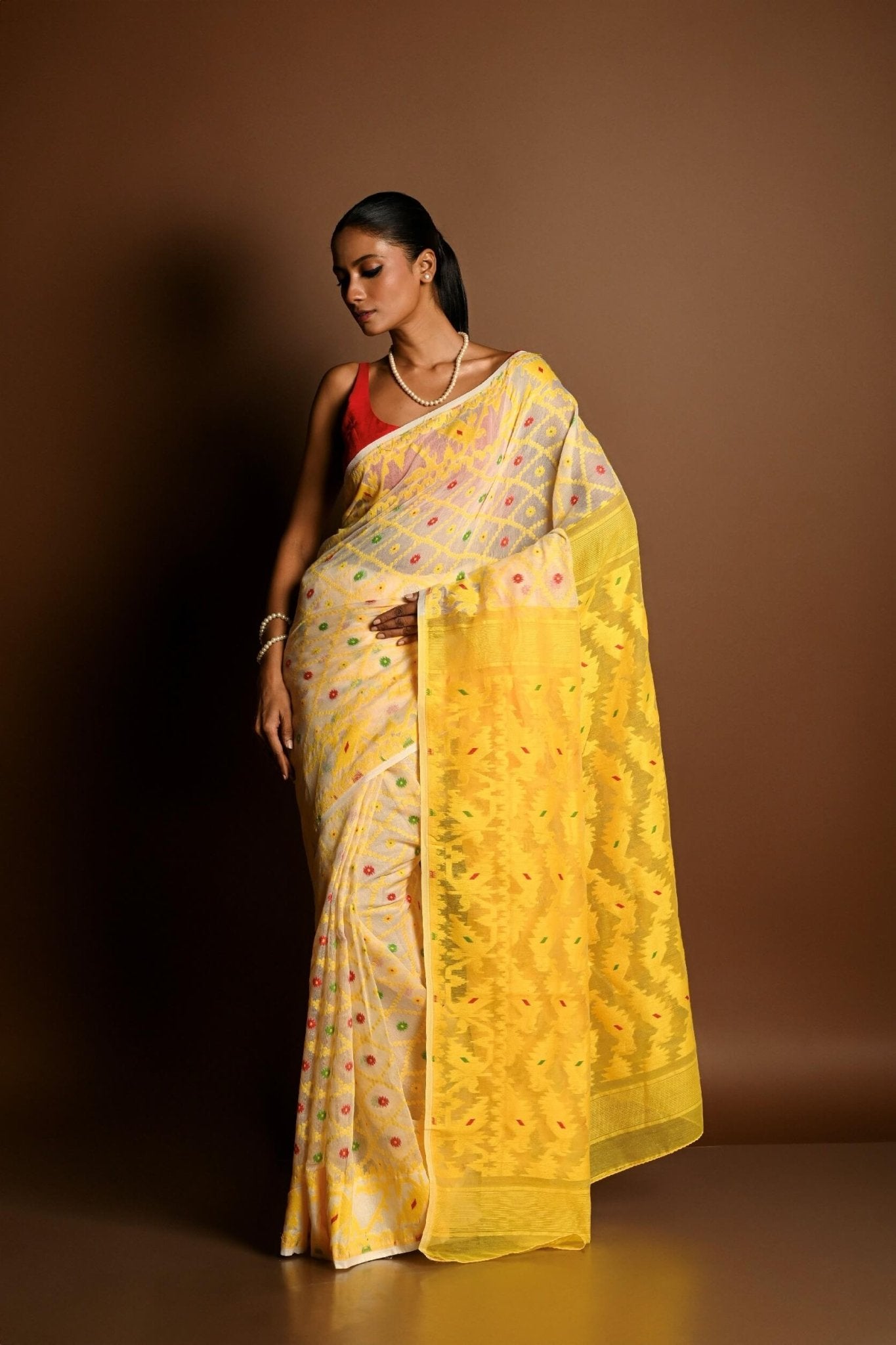 Yellow Pure Tant Jamdani Saree with All Over Red and Green Buta - Anvi Couture