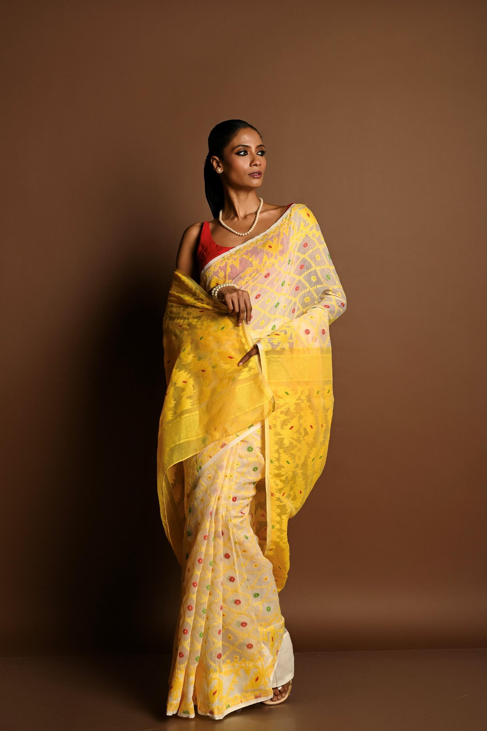 Yellow Pure Tant Jamdani Saree with All Over Red and Green Buta - Anvi Couture