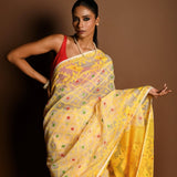 Yellow Pure Tant Jamdani Saree with All Over Red and Green Buta - Anvi Couture