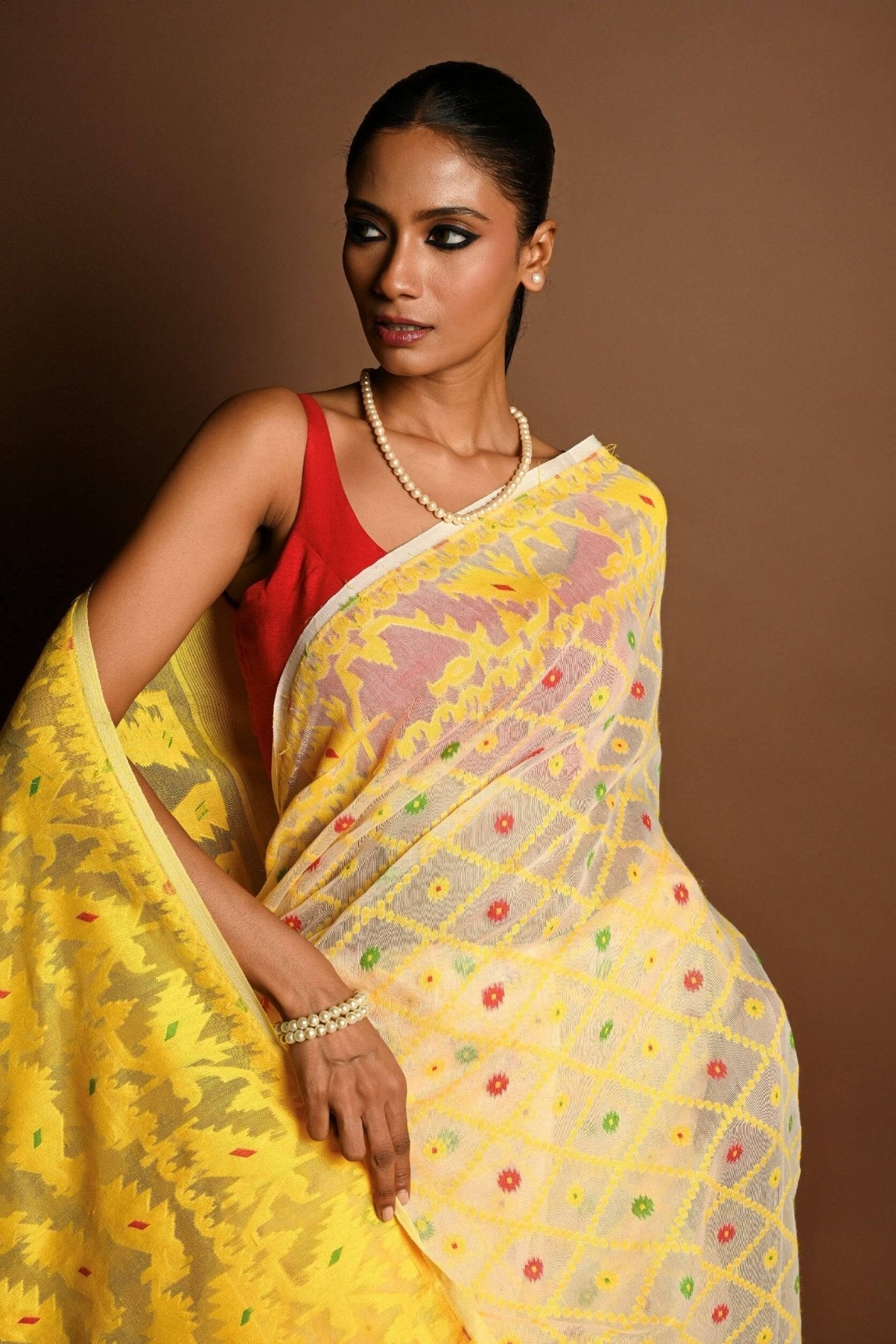 Yellow Pure Tant Jamdani Saree with All Over Red and Green Buta - Anvi Couture