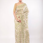 Off - White Jamdani Saree with All - Over Green and Gold Floral Motifs - Anvi Couture