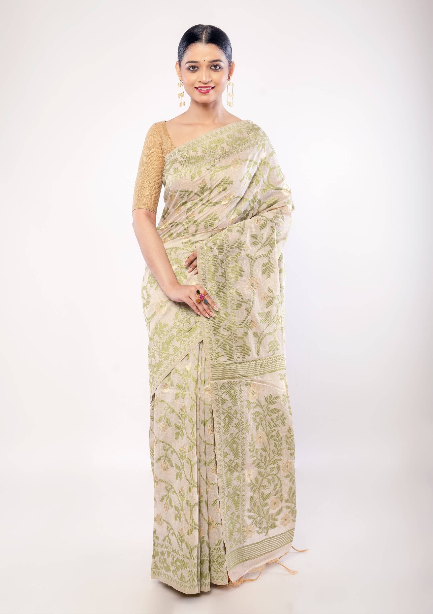 Off - White Jamdani Saree with All - Over Green and Gold Floral Motifs - Anvi Couture