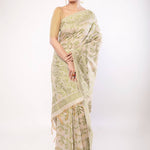 Off - White Jamdani Saree with All - Over Green and Gold Floral Motifs - Anvi Couture