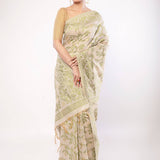 Off - White Jamdani Saree with All - Over Green and Gold Floral Motifs - Anvi Couture