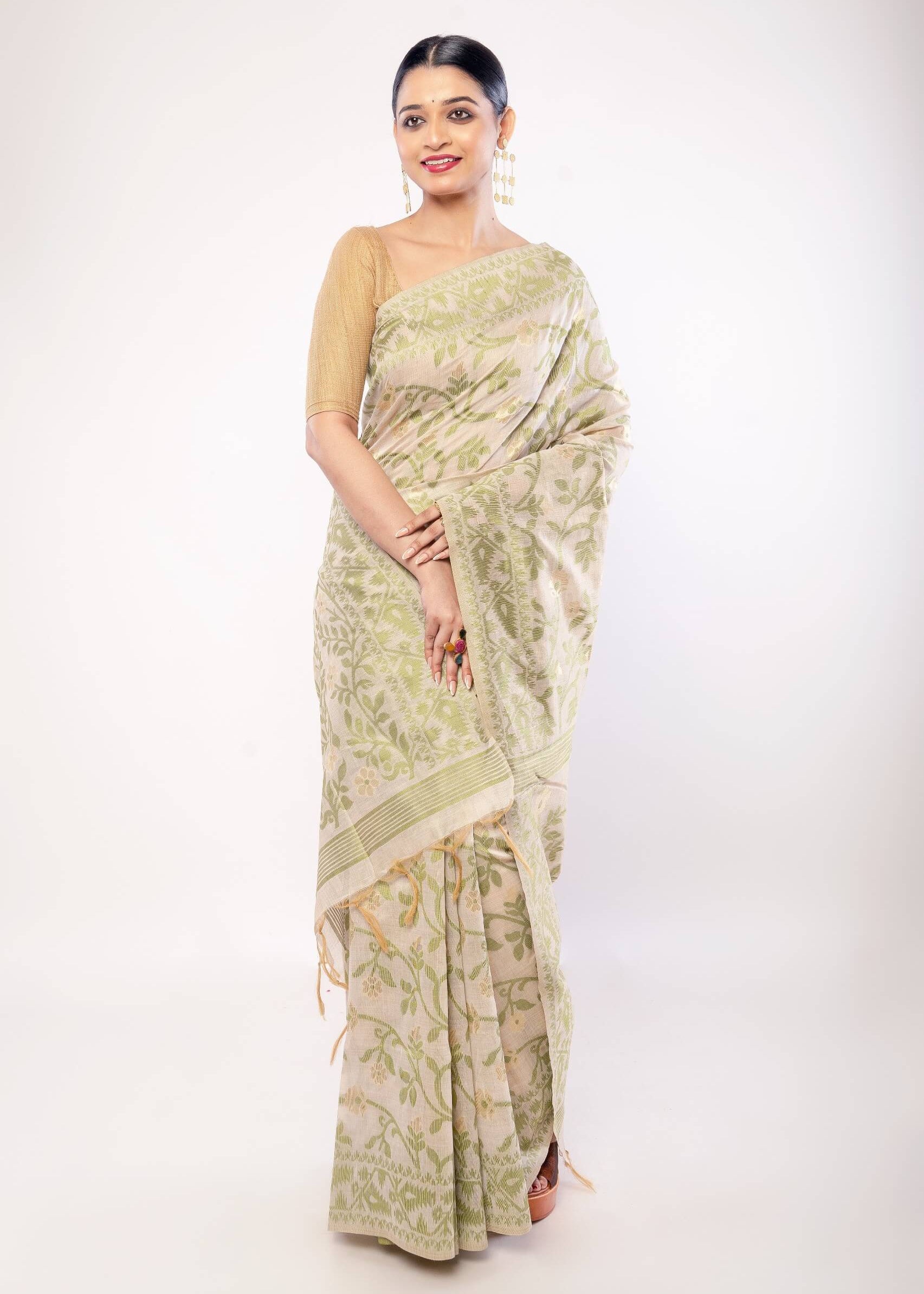 Off - White Jamdani Saree with All - Over Green and Gold Floral Motifs - Anvi Couture
