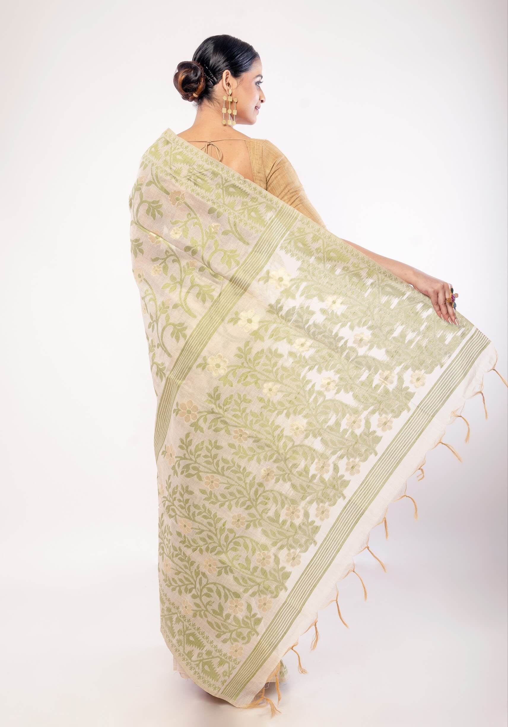 Off - White Jamdani Saree with All - Over Green and Gold Floral Motifs - Anvi Couture