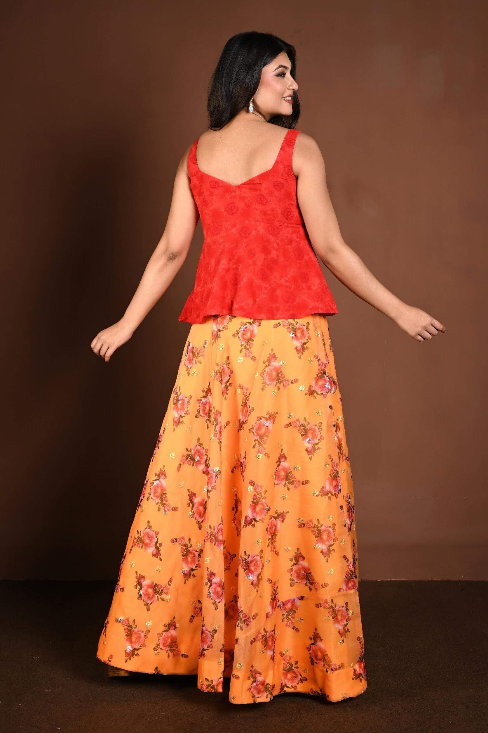 Yellow Floral Lehenga with Contrasting Red Peplum Choli - Anvi Couture