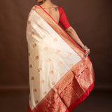White Katan Silk Saree with Contrasting Red Border and Gold Zari Work - Anvi Couture