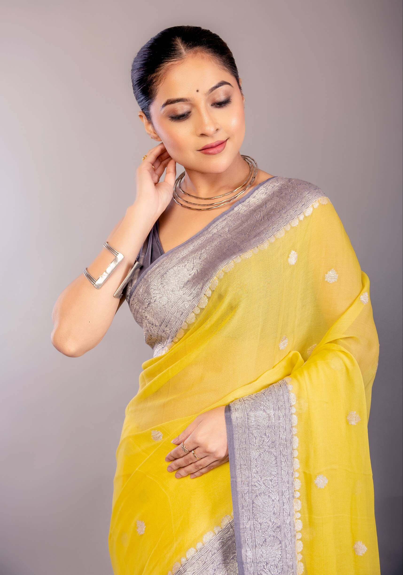 Yellow Khaddi Georgette Banarasi Saree with Contrasting Gray Zari Border - Anvi Couture