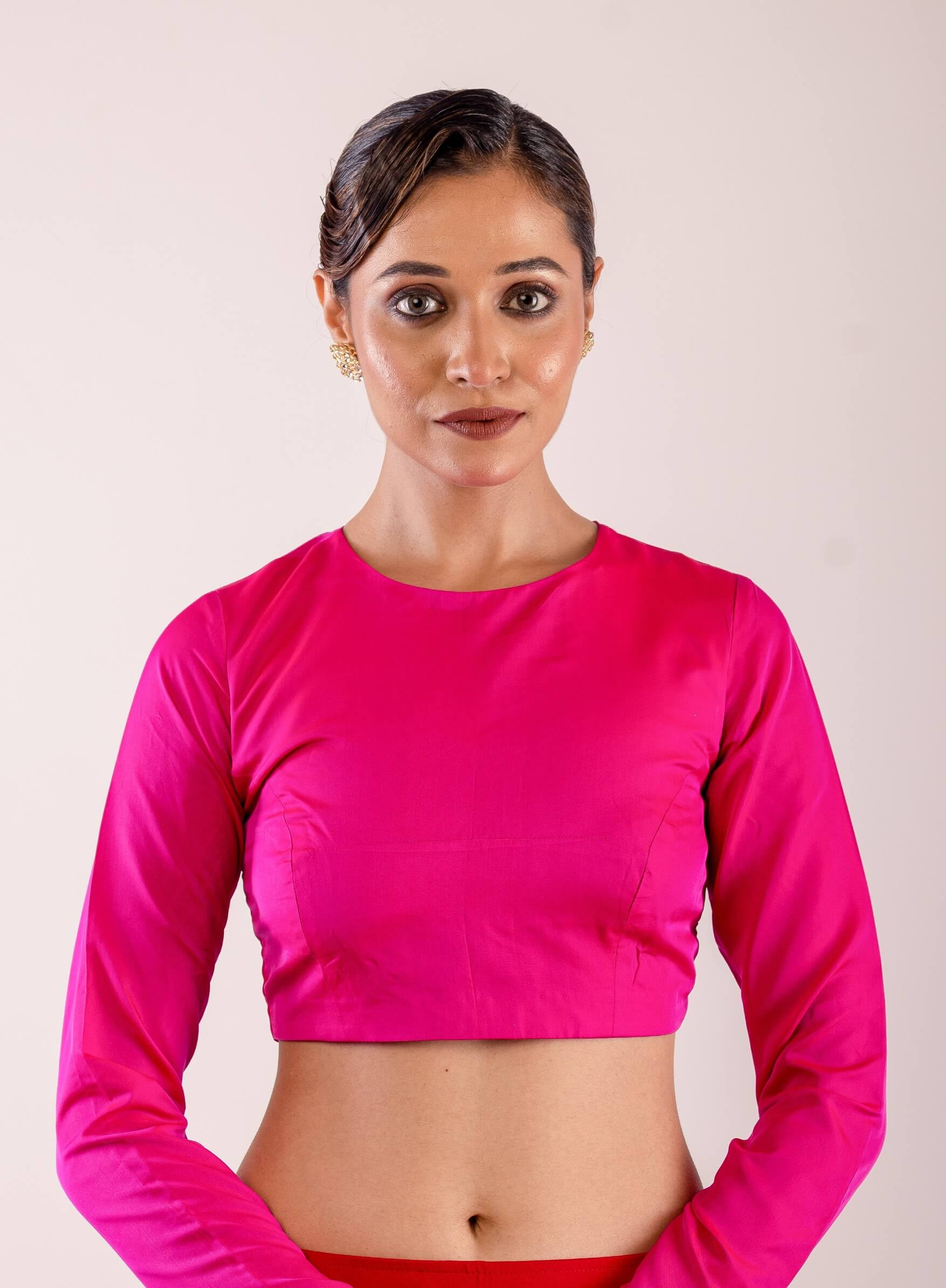 Woman Wearing a Rani Pink Full Sleeve Formal Blouse with High Neck- Elegant Workwear Essential for Women: Anvi Couture - Image 1