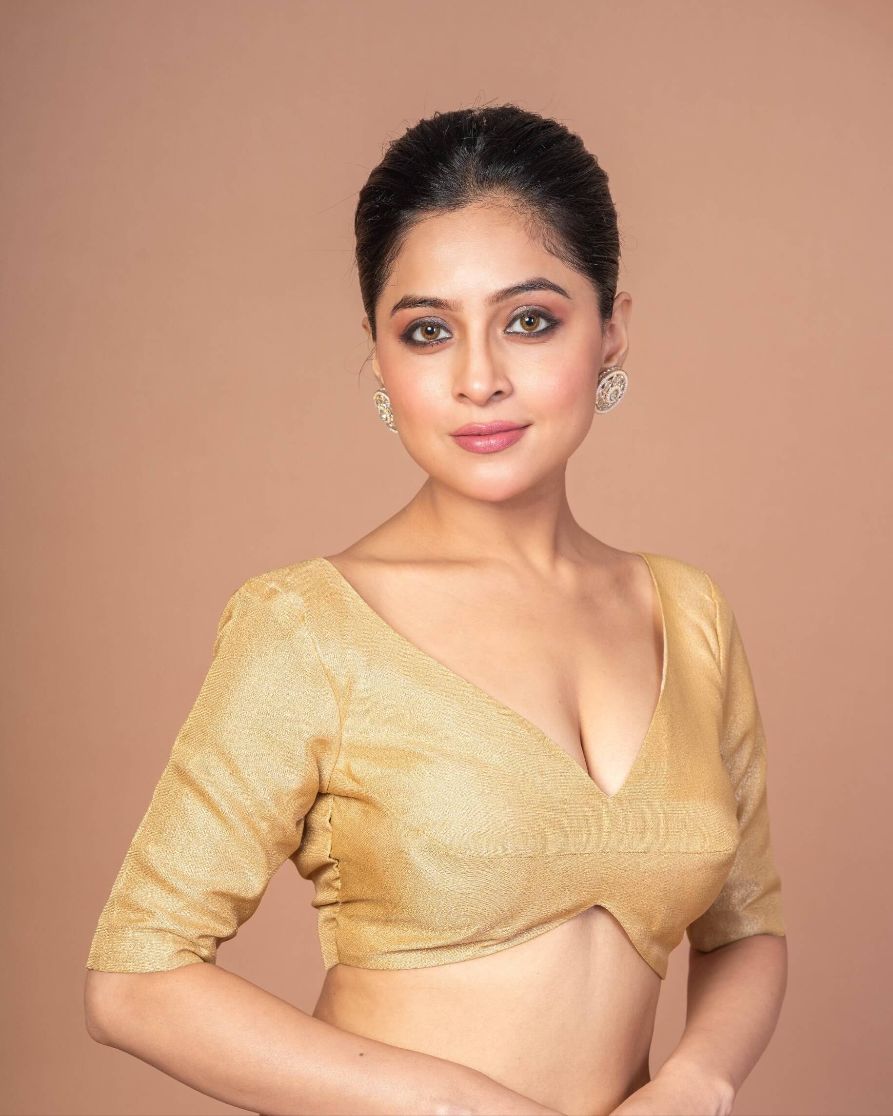 woman dressed in a Gold Tissue Silk V-Neckline Blouse with Elbow Sleeves: Festive Wear Blouses - Anvi Couture - Image 3