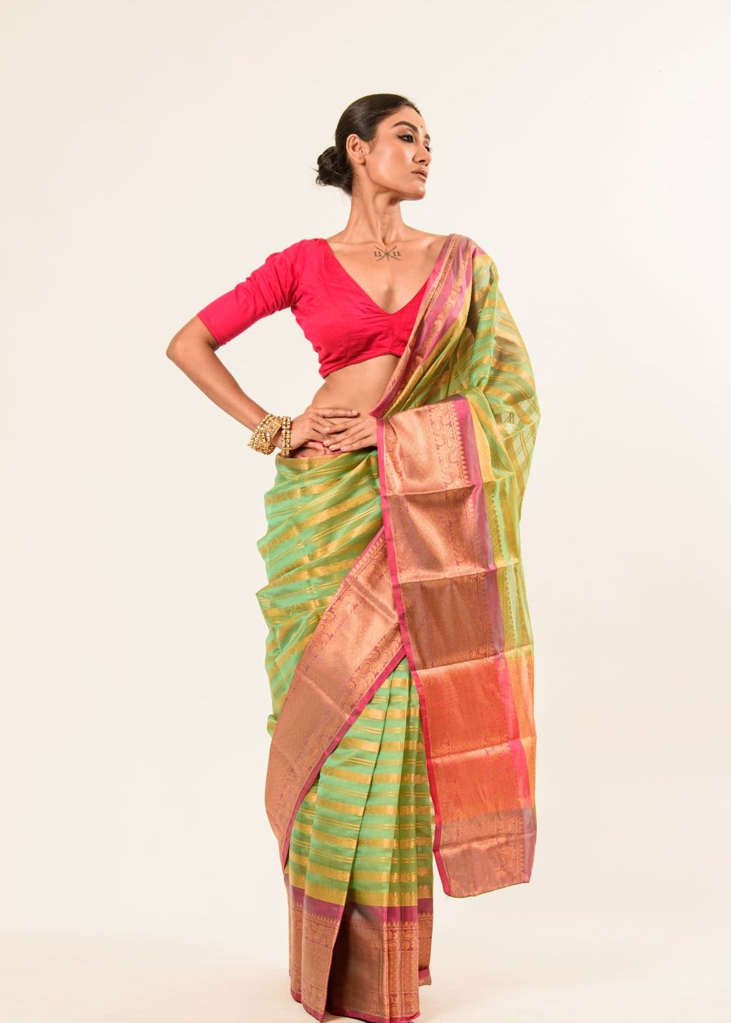 Green Organza Silk Saree with Pink Border and Gold Strip - Image 1