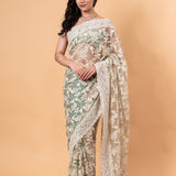 Pastel Green Net Saree with all over Stone and embroidery work And Unstitch blouse - Image 1