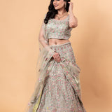 Net Pastel Lehenga and Choli Set with All Over Handwork Embroidery and Tassel Dupatta