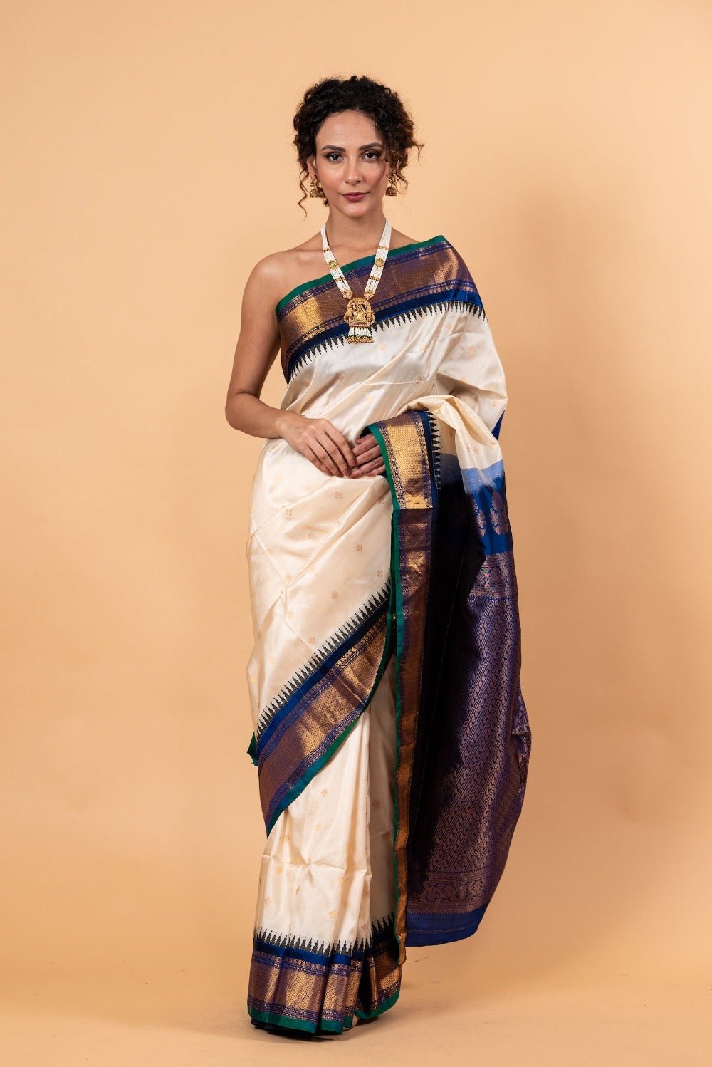 Pearl White Gadwal Silk Saree with Floral Motifs - Anvi Couture - Image 1