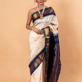 Pearl White Gadwal Silk Saree with Floral Motifs - Anvi Couture - Image 1