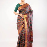 Maroon Patola Silk Saree with Contrasting Gold Zari Border - Anvi Couture