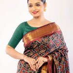 Maroon Patola Silk Saree with Contrasting Gold Zari Border - Anvi Couture