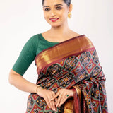 Maroon Patola Silk Saree with Contrasting Gold Zari Border - Anvi Couture