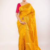 Yellow Art Silk Saree with Gold Zari Border and Orange Floral Motifs - Anvi Couture