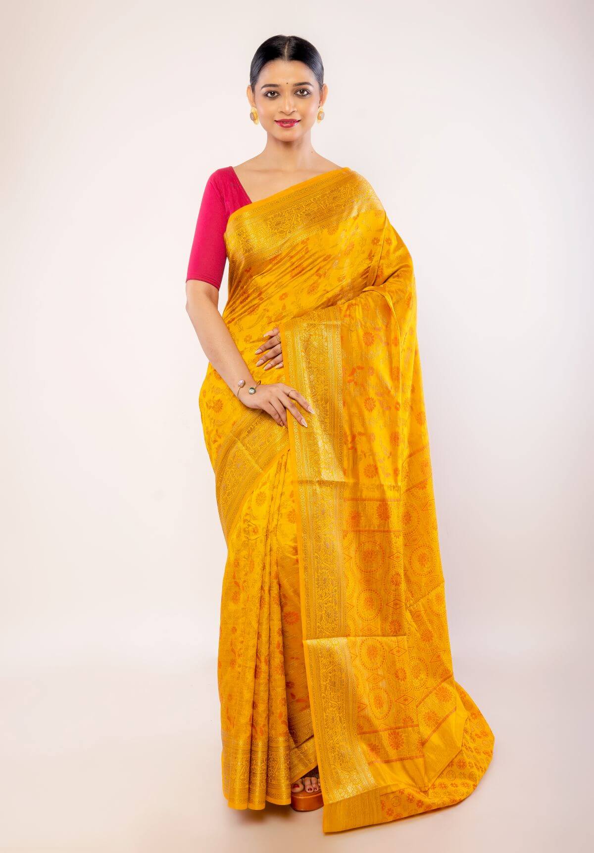 Yellow Art Silk Saree with Gold Zari Border and Orange Floral Motifs - Anvi Couture