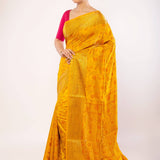 Yellow Art Silk Saree with Gold Zari Border and Orange Floral Motifs - Anvi Couture