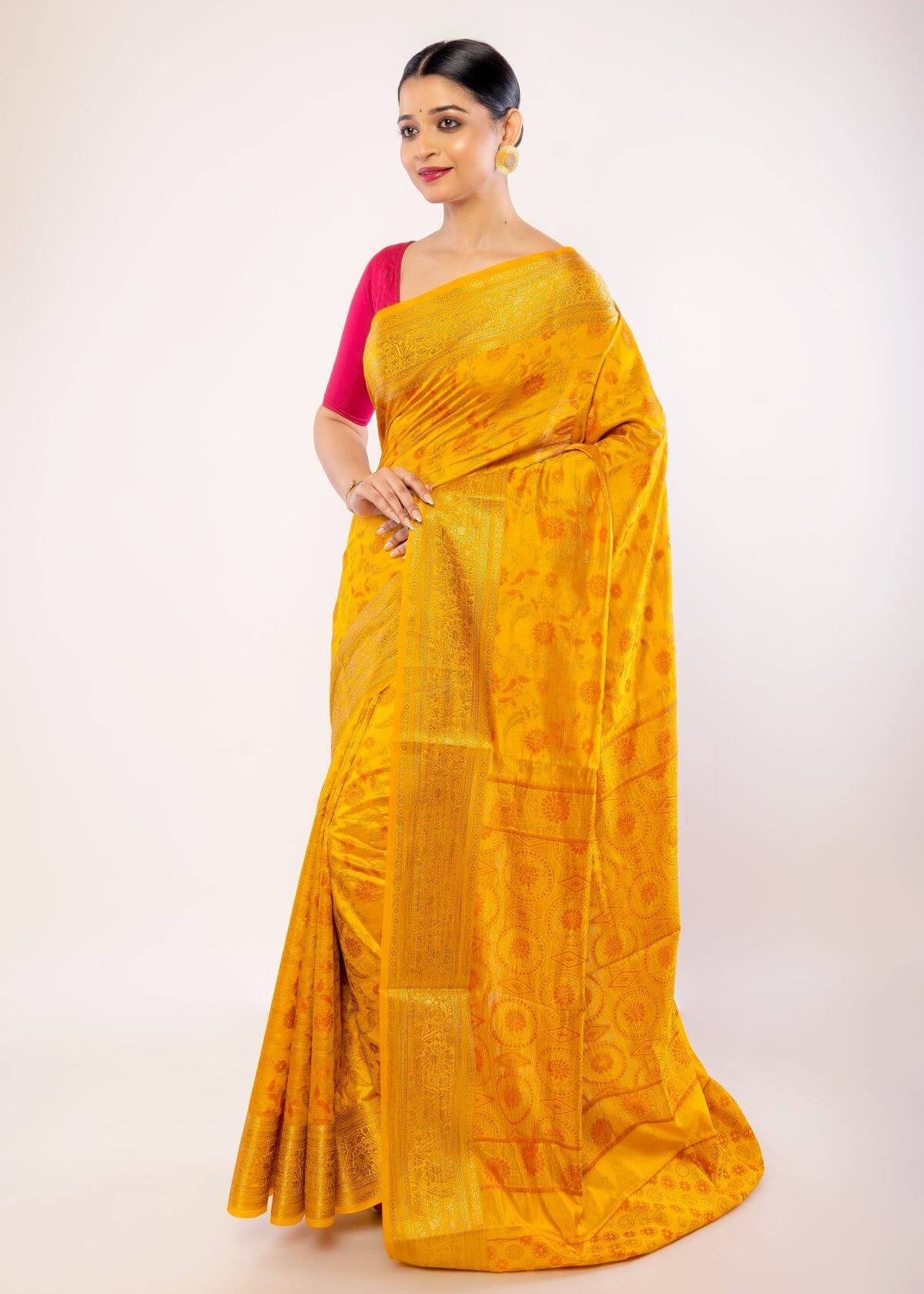 Yellow Art Silk Saree with Gold Zari Border and Orange Floral Motifs - Anvi Couture