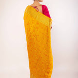 Yellow Art Silk Saree with Gold Zari Border and Orange Floral Motifs - Anvi Couture