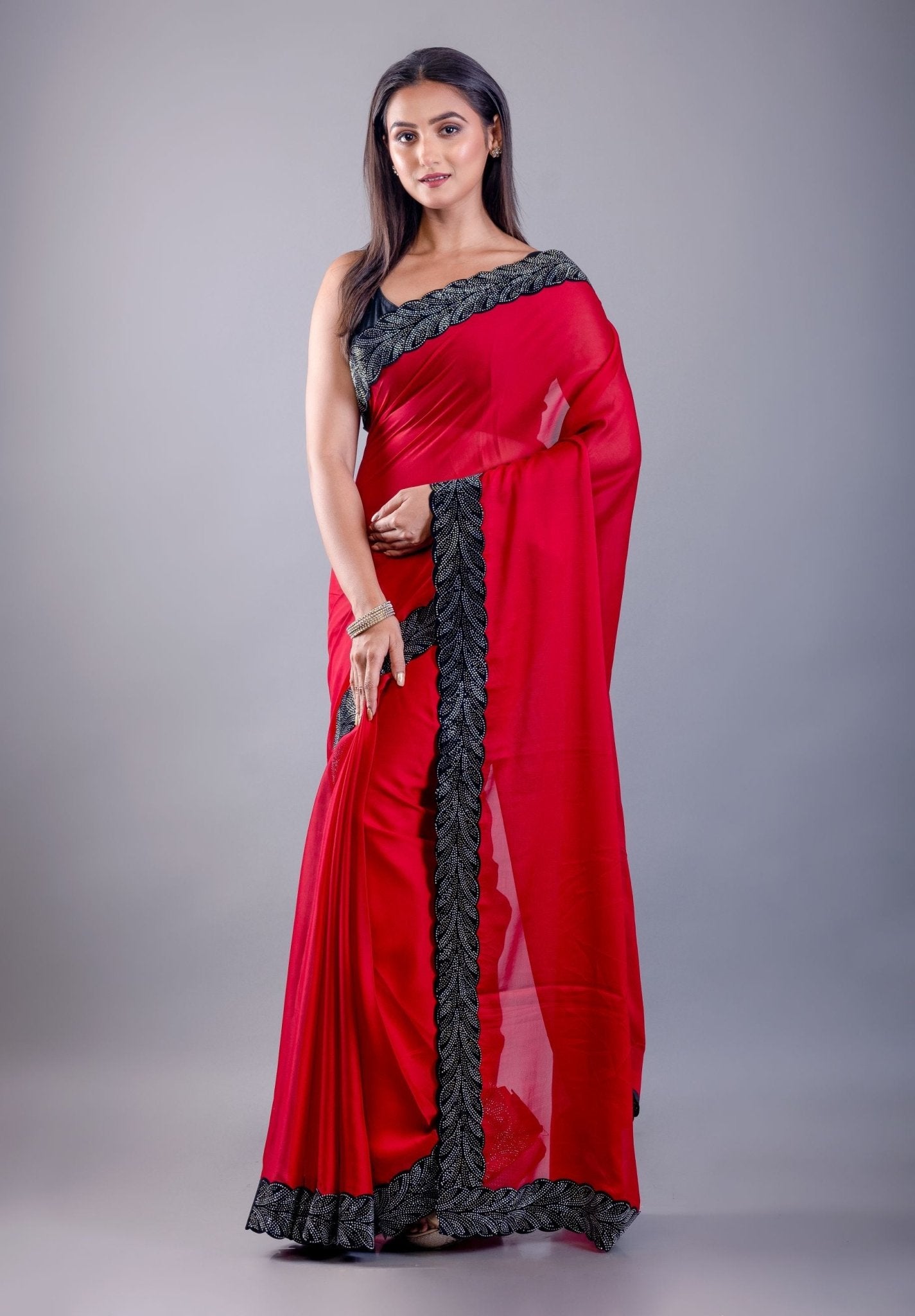 Red Jimmy Choo Saree with Black Stone Emblishment Border - Anvi Couture