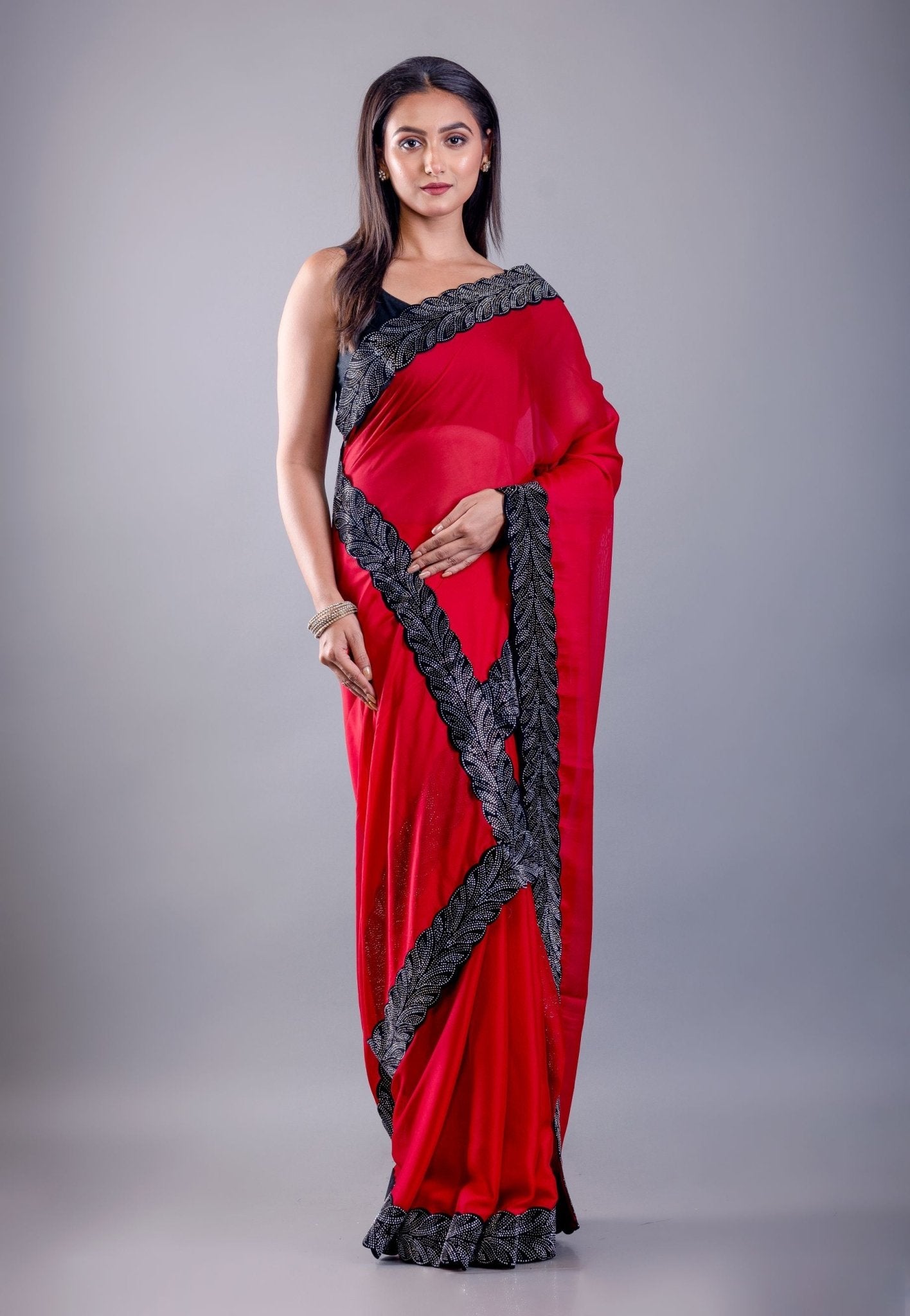 Red Jimmy Choo Saree with Black Stone Emblishment Border - Anvi Couture
