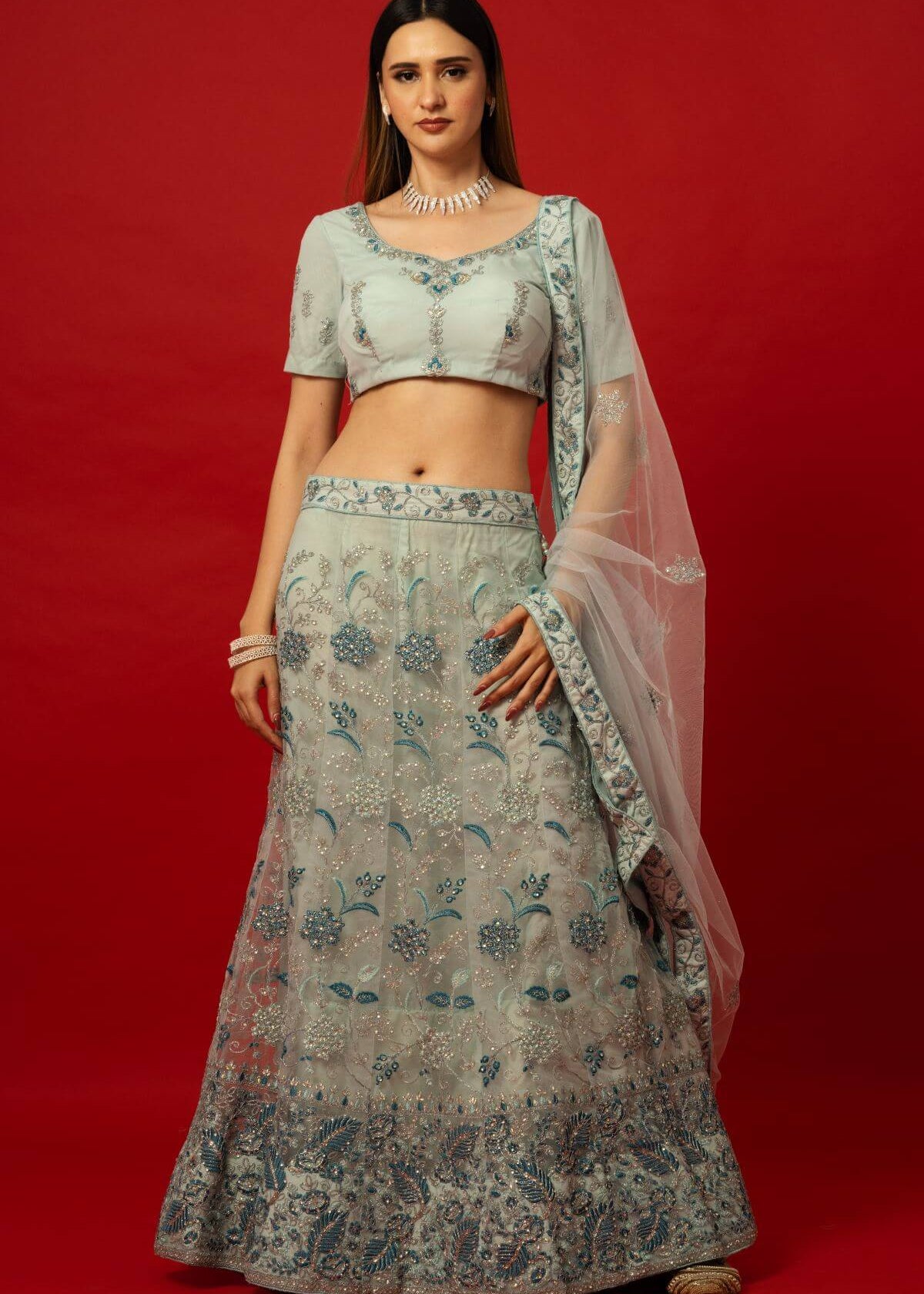 Light Blue Lehenga Choli with Intricate Embroidery and Subtle Glitter Details