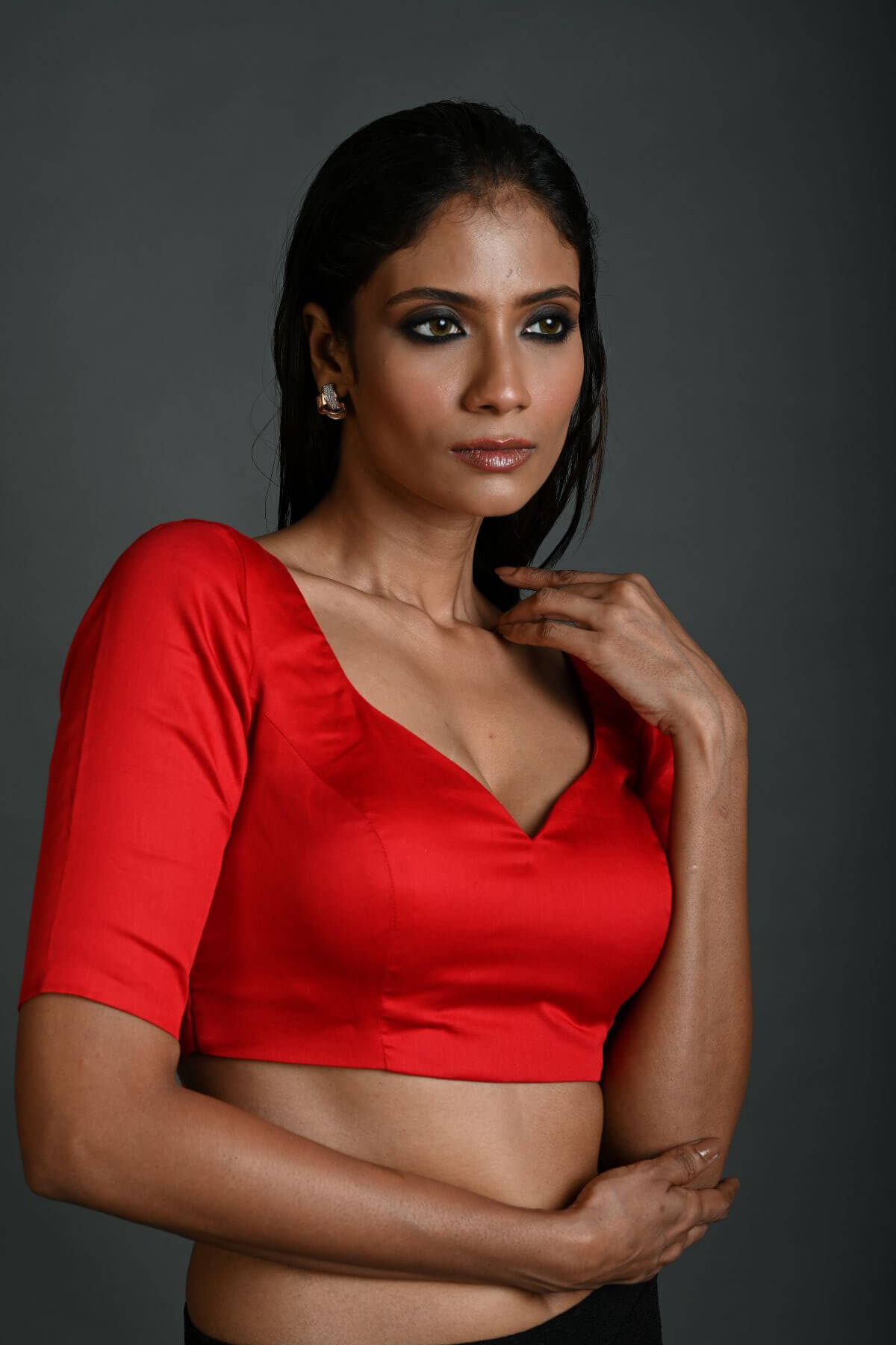 Elegant Red color ethnic blouse featuring a unique strappy back design for women