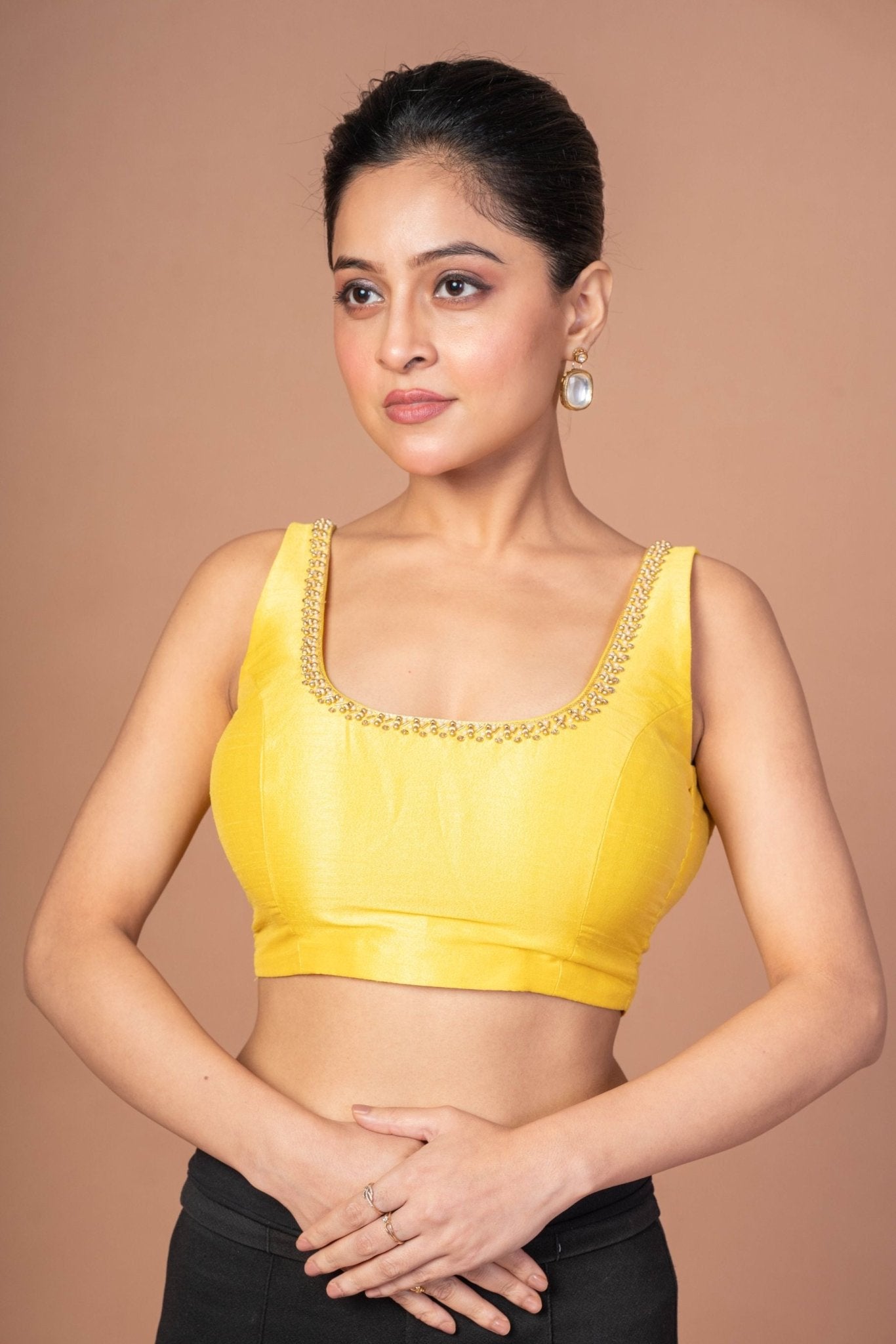 Yellow Raw Silk Cutdana Embroidered U Neck Sleeveless Blouse - Anvi Couture