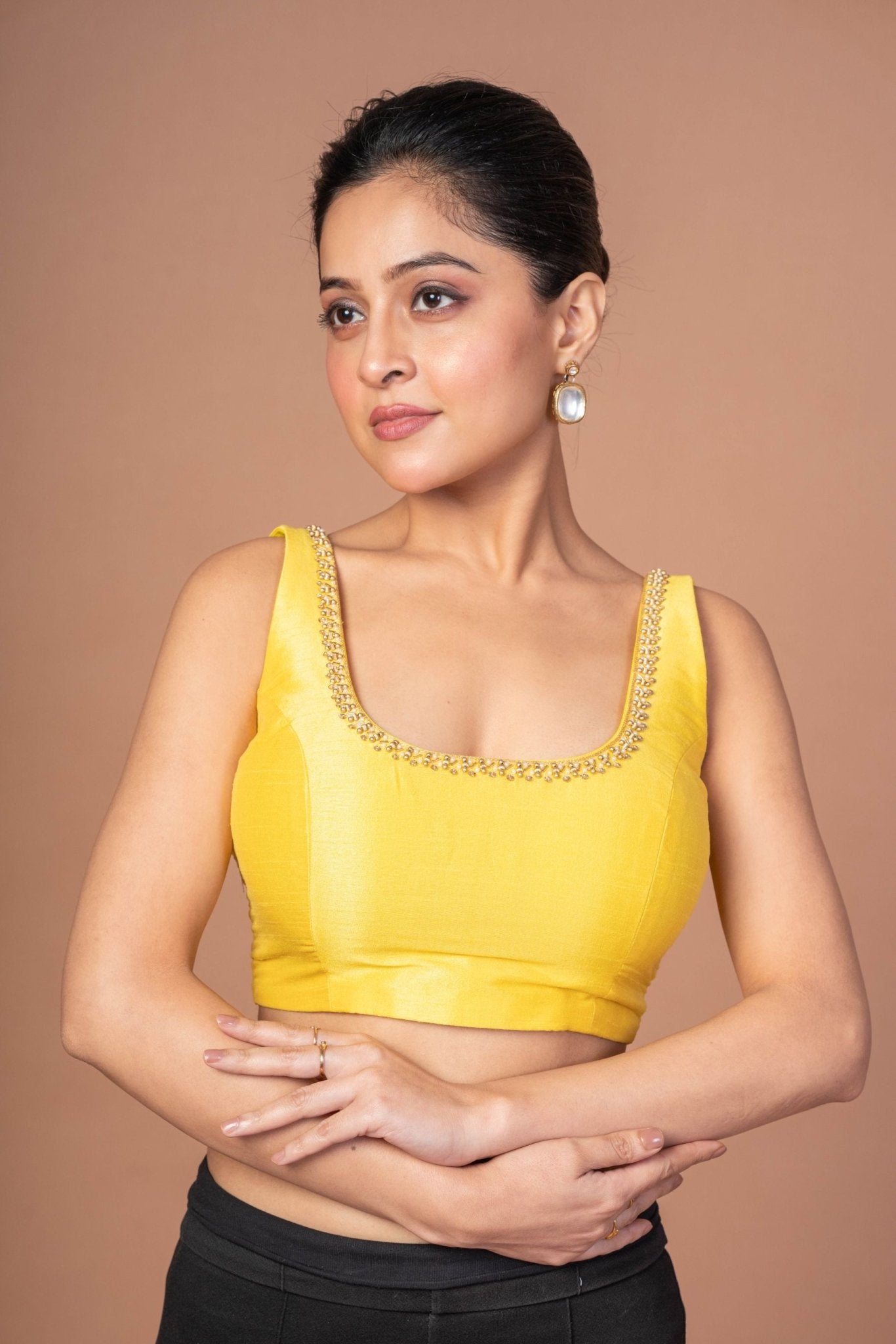Yellow Raw Silk Cutdana Embroidered U Neck Sleeveless Blouse - Anvi Couture