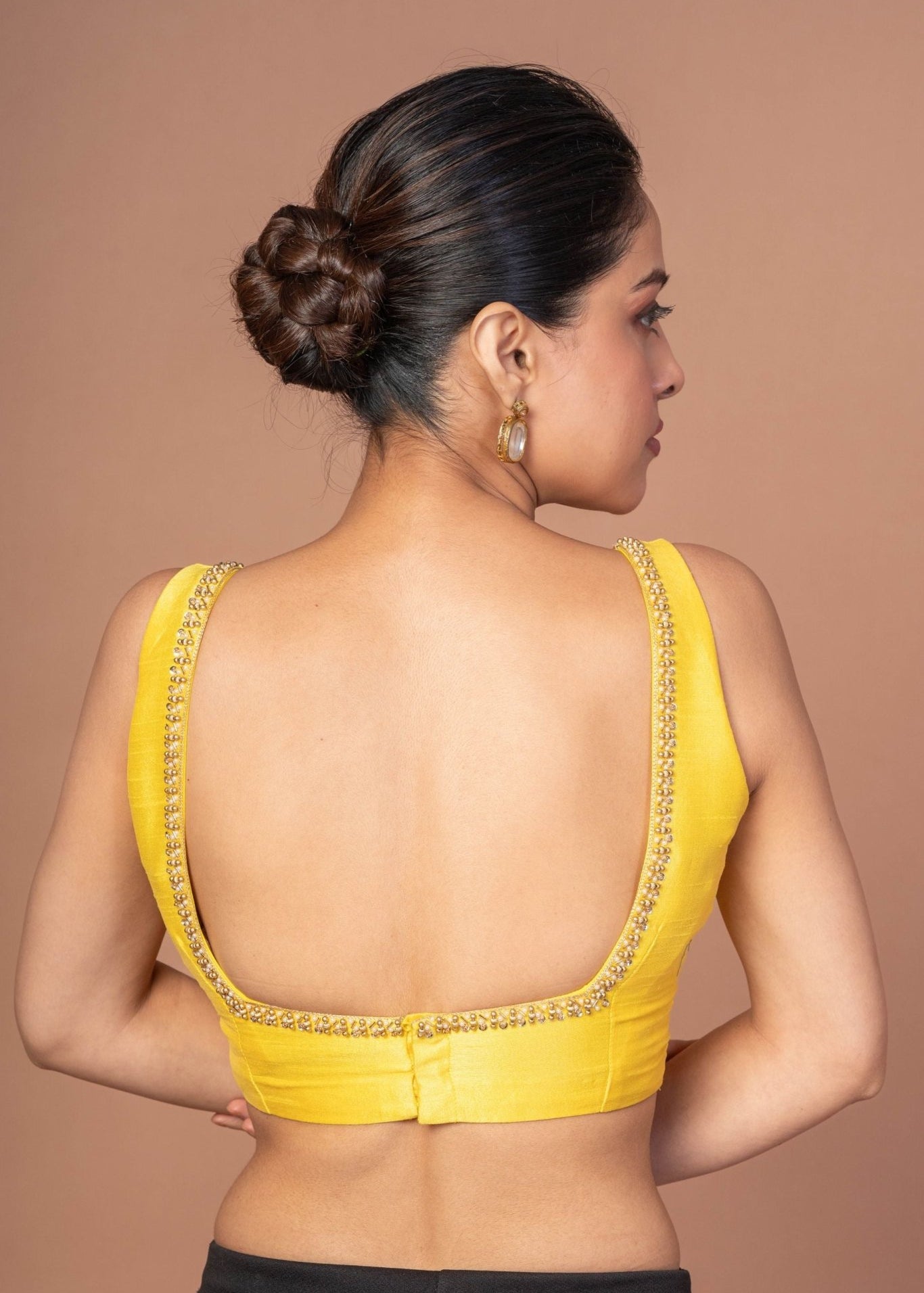 Yellow Raw Silk Cutdana Embroidered U Neck Sleeveless Blouse - Anvi Couture