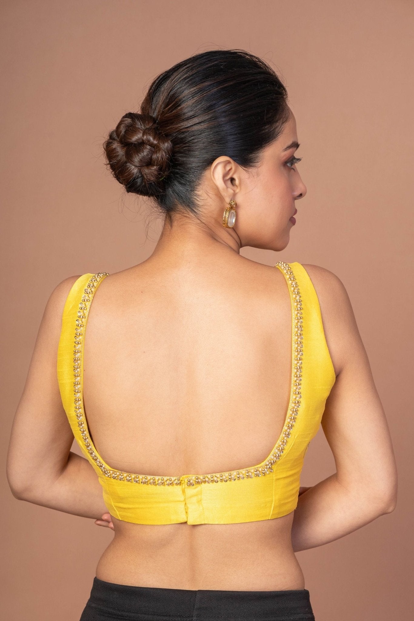 Yellow Raw Silk Cutdana Embroidered U Neck Sleeveless Blouse - Anvi Couture