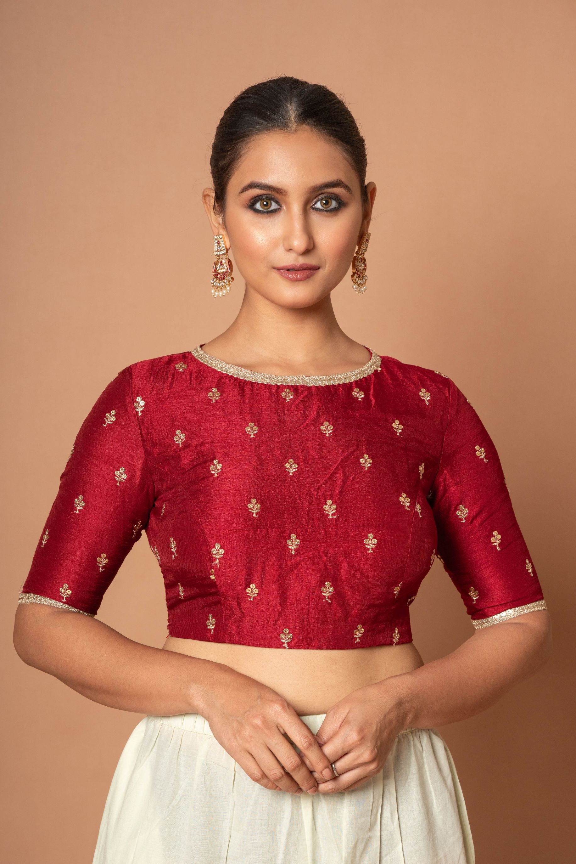 Marron Raw silk floral Embroidered Boat Neck Blouse with Golden Border
image 1
