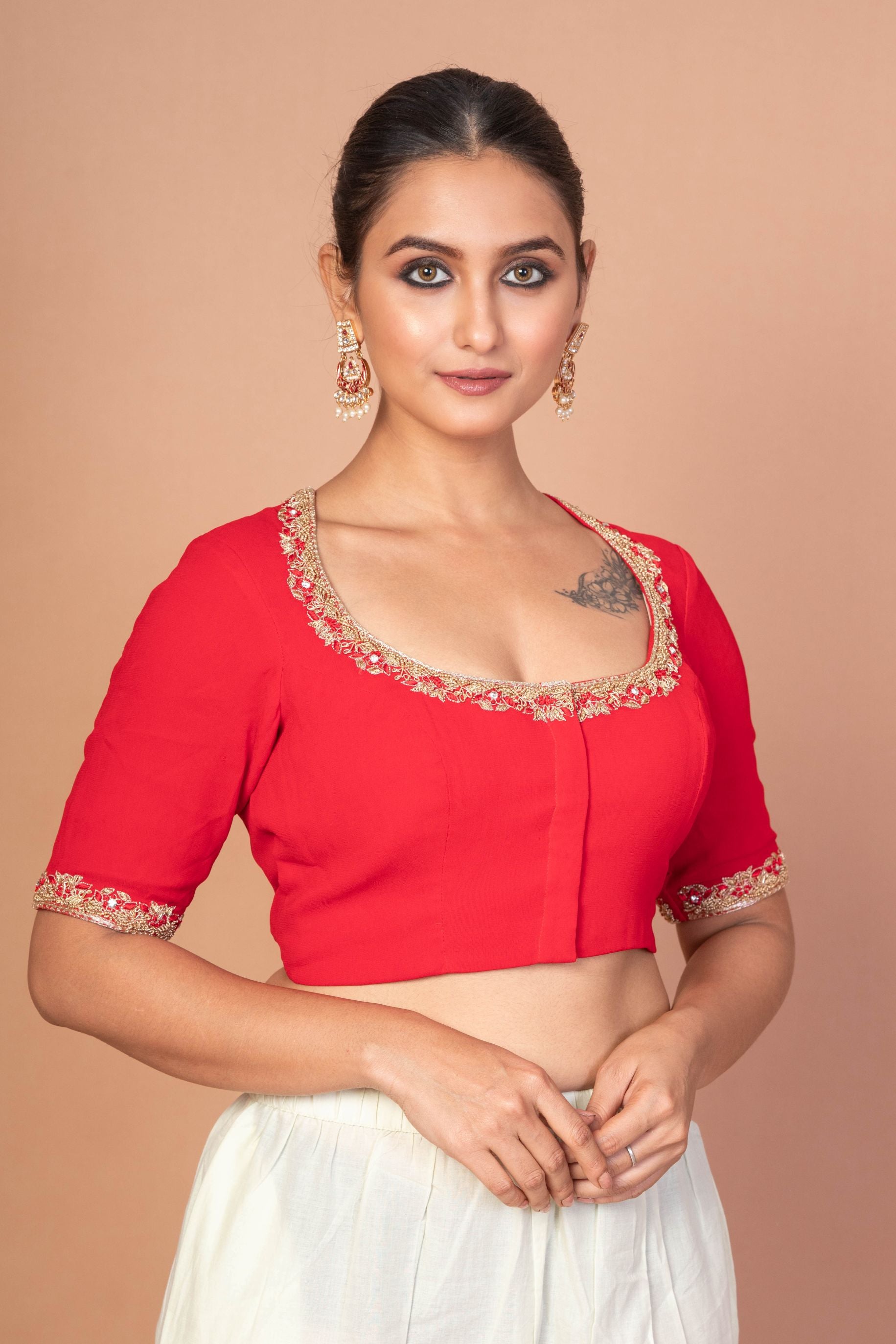 Red Hand-Embroidered Blouse with Round Neck and Back Closure
img 2