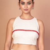 Designer White Hakoba Blouse with Sleeveless Cut and Red Lace Embroidery - Anvi Couture