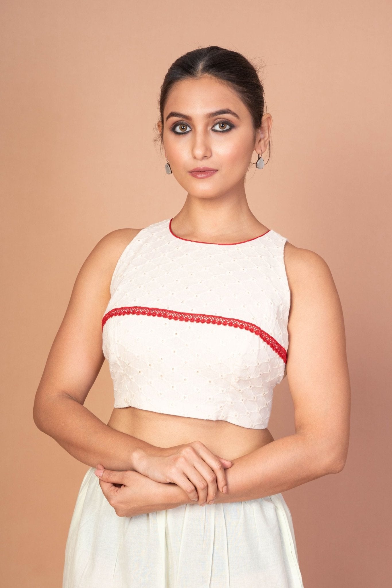 Designer White Hakoba Blouse with Sleeveless Cut and Red Lace Embroidery - Anvi Couture