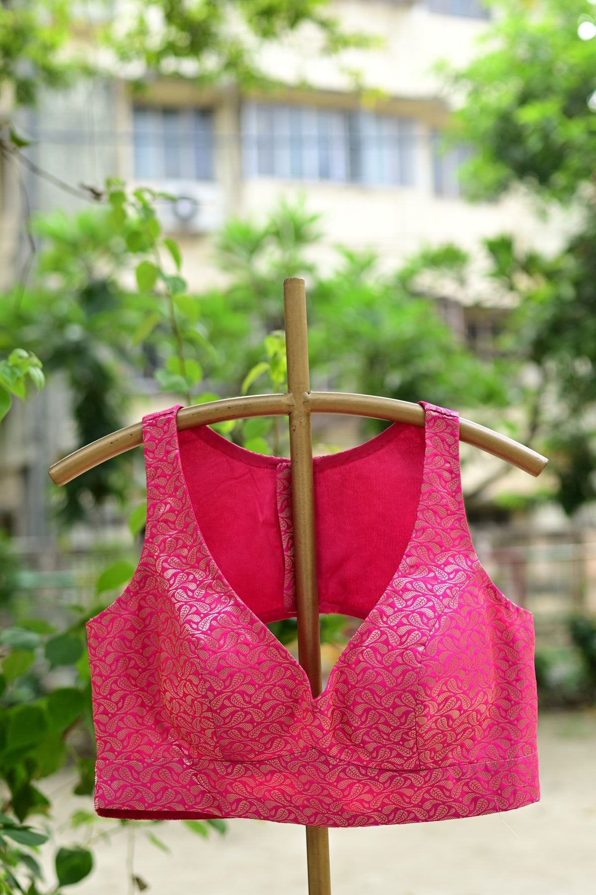 Fusia Pink Brocade Sleeveless Blouse with Curved V Neckline and Back Cutout - Anvi Couture