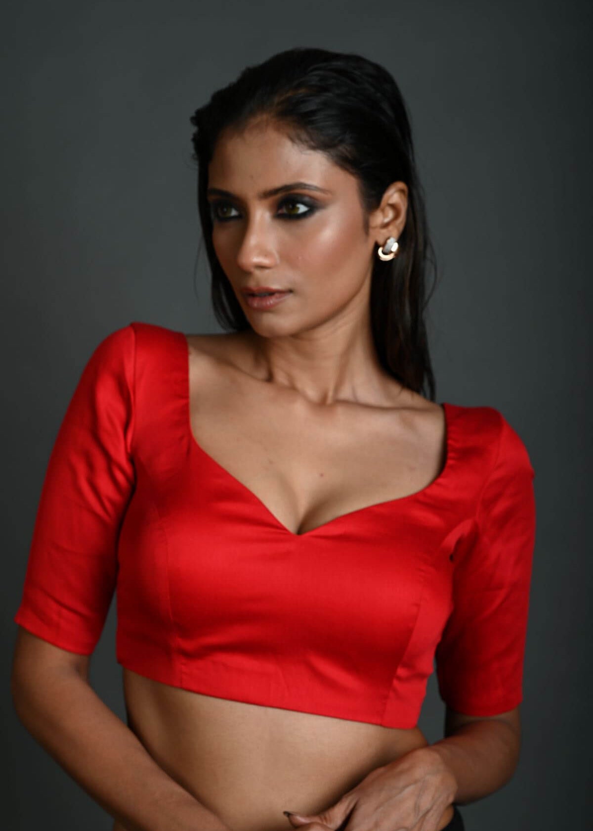 Red Strappy back party blouse with intricate design for ethnic and festive occasions