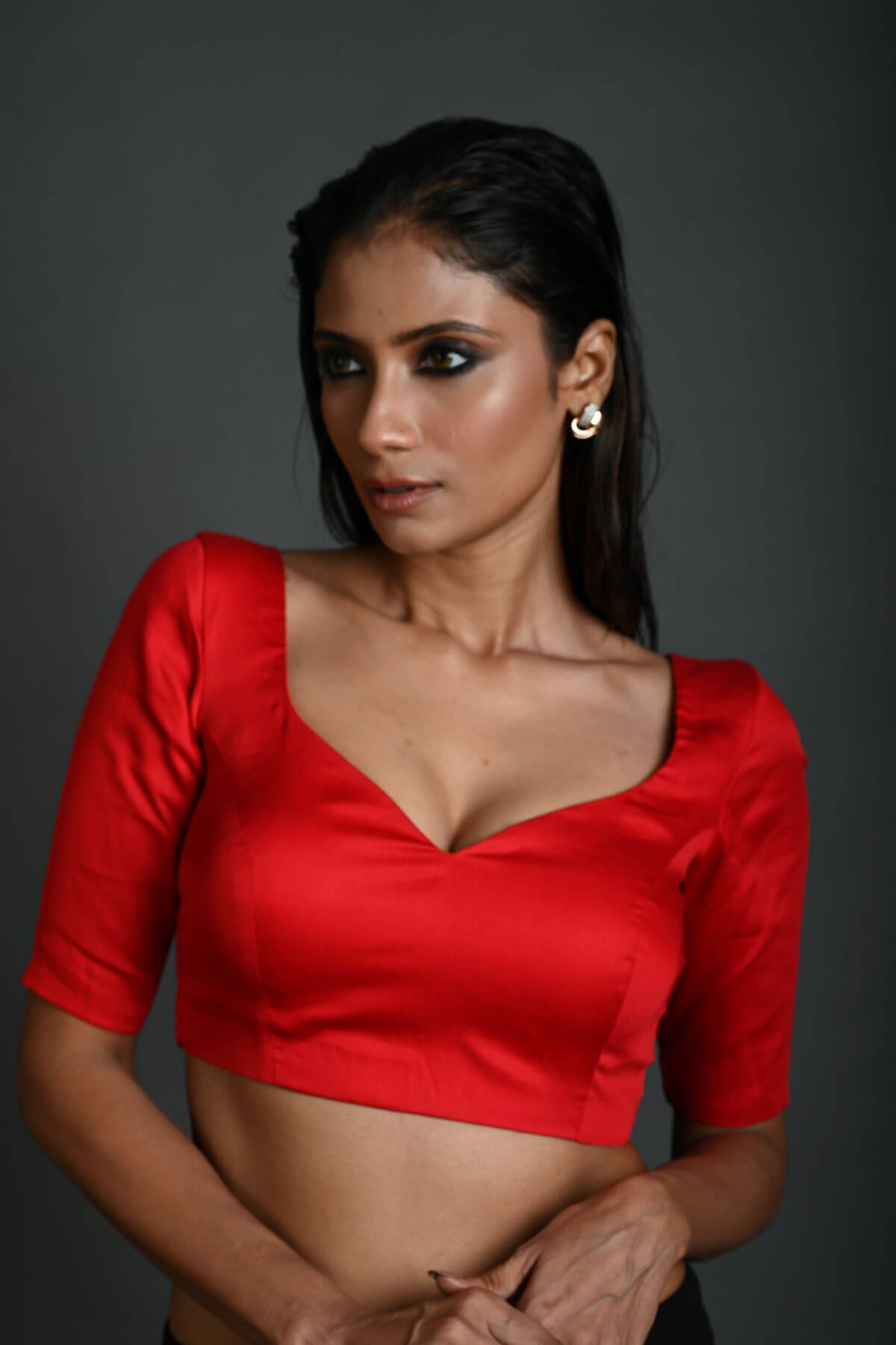 Red Strappy back party blouse with intricate design for ethnic and festive occasions