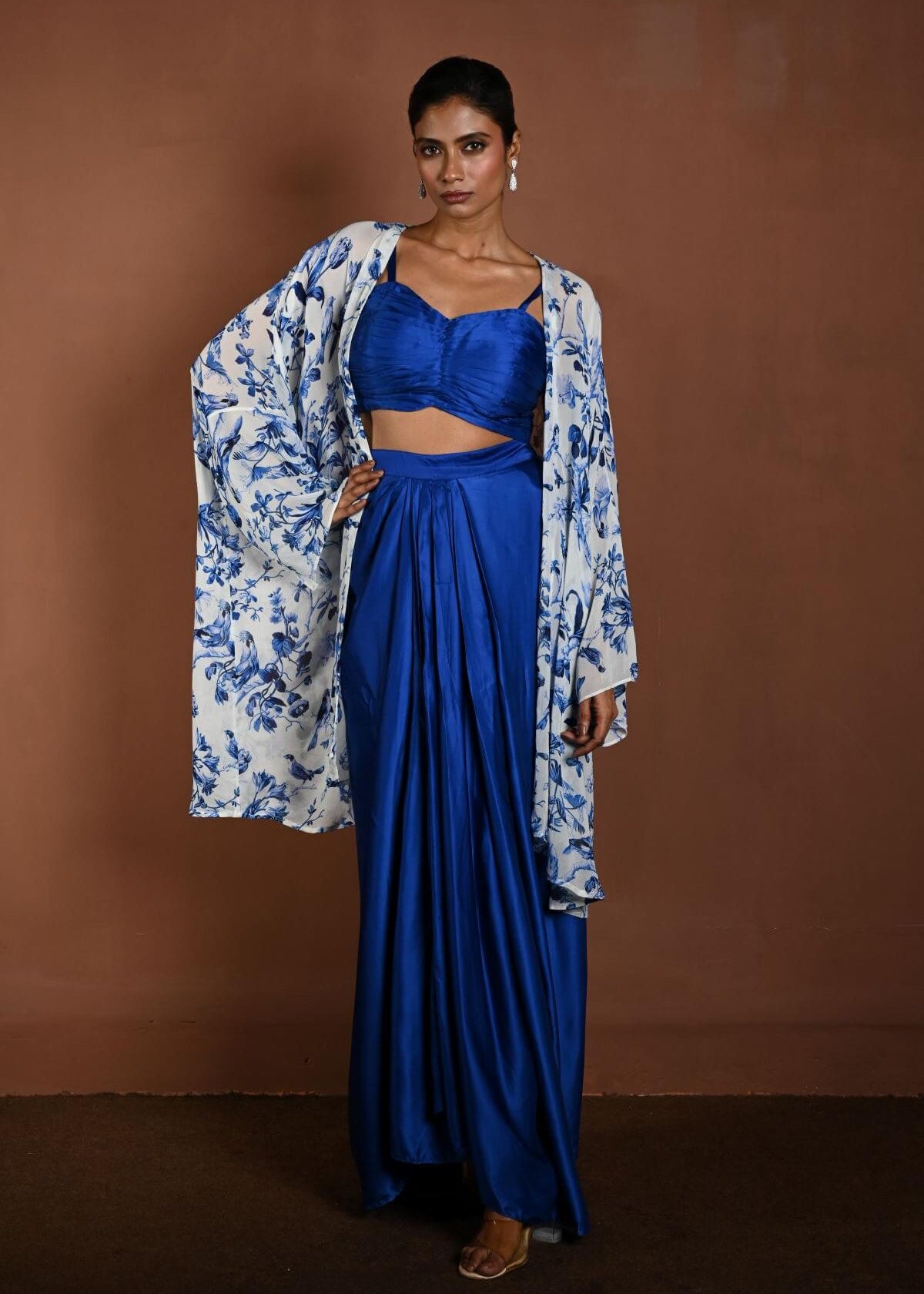 Blue Draped Skirt Set with Matching Blouse and White Cape Jacket - Anvi Couture