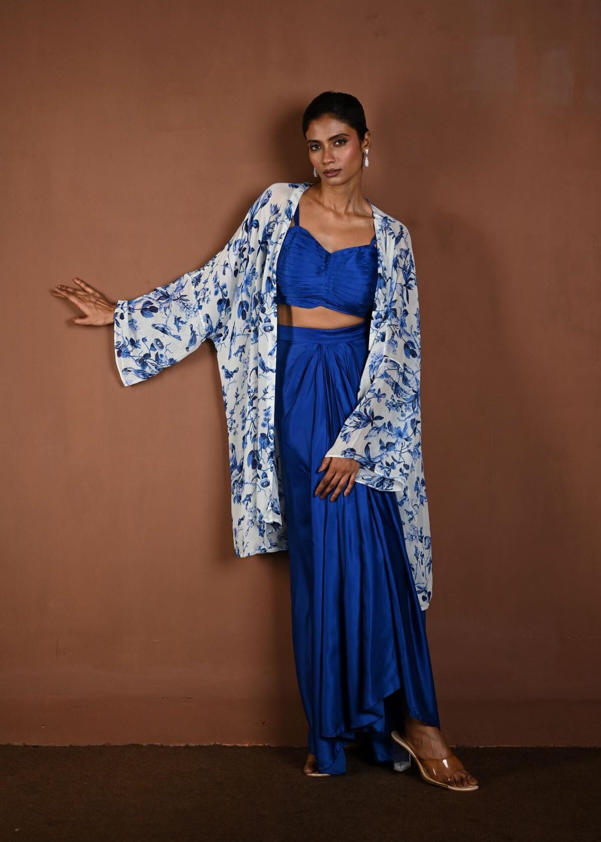 Blue Draped Skirt Set with Matching Blouse and White Cape Jacket - Anvi Couture