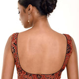 A Woman Wearing a Maroon Ajrakh Print Pure Cotton Sleeveless Blouse with Sweetheart Neckline - Anvi Couture - Image 4