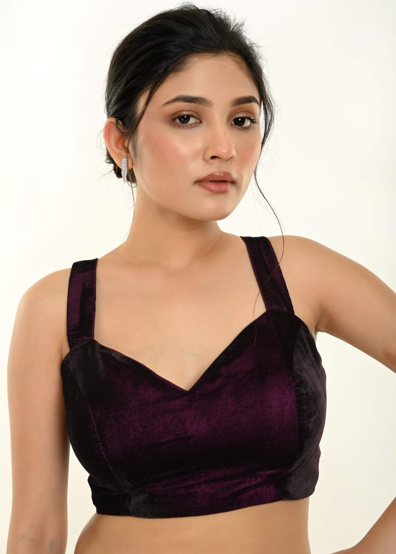A Woman Wearing a Maroon Velvet Sleeveless Blouse with Sweetheart Neckline - Party Wear - Anvi Couture Image 2