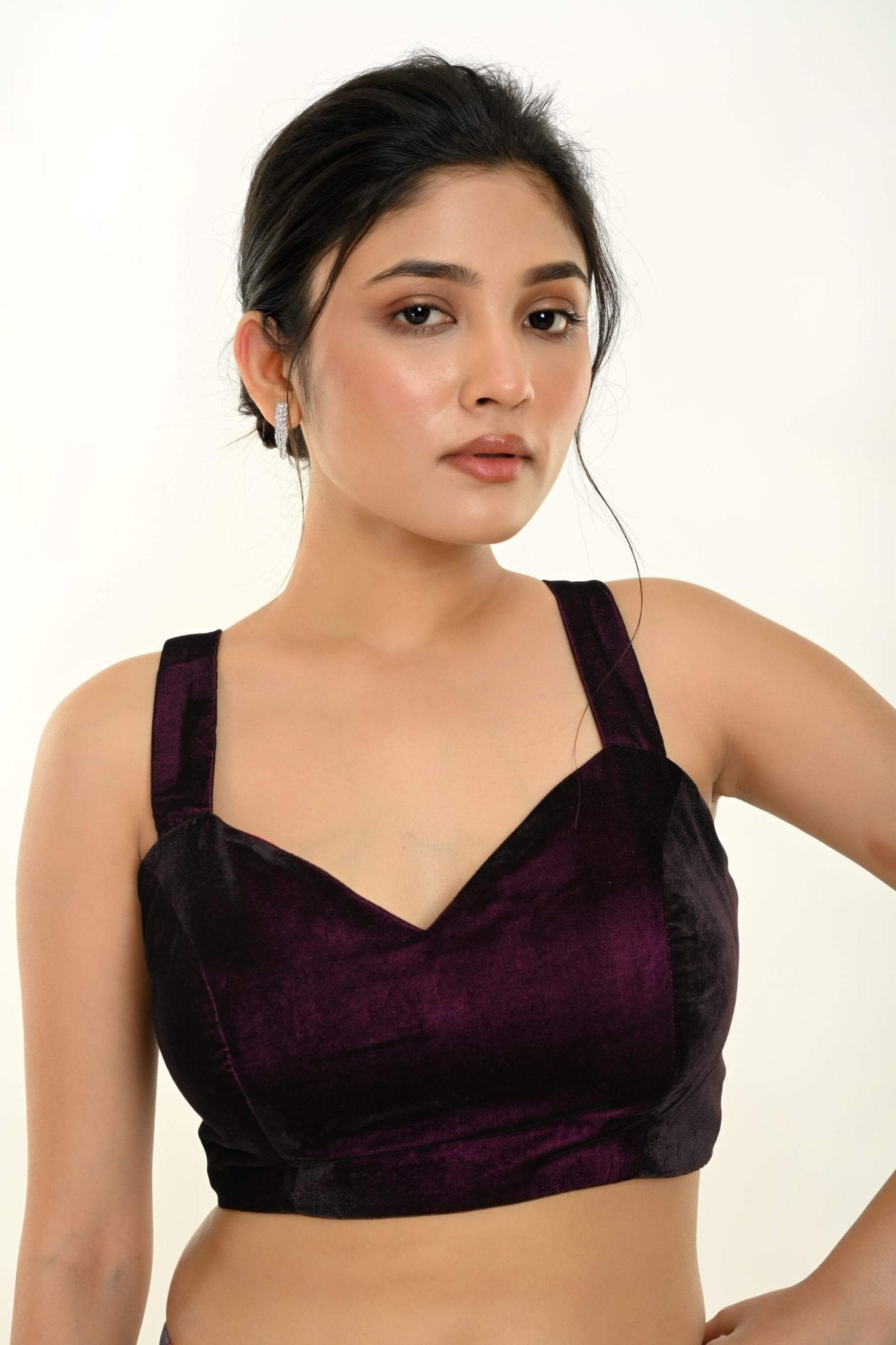 A Woman Wearing a Maroon Velvet Sleeveless Blouse with Sweetheart Neckline - Party Wear - Anvi Couture Image 2