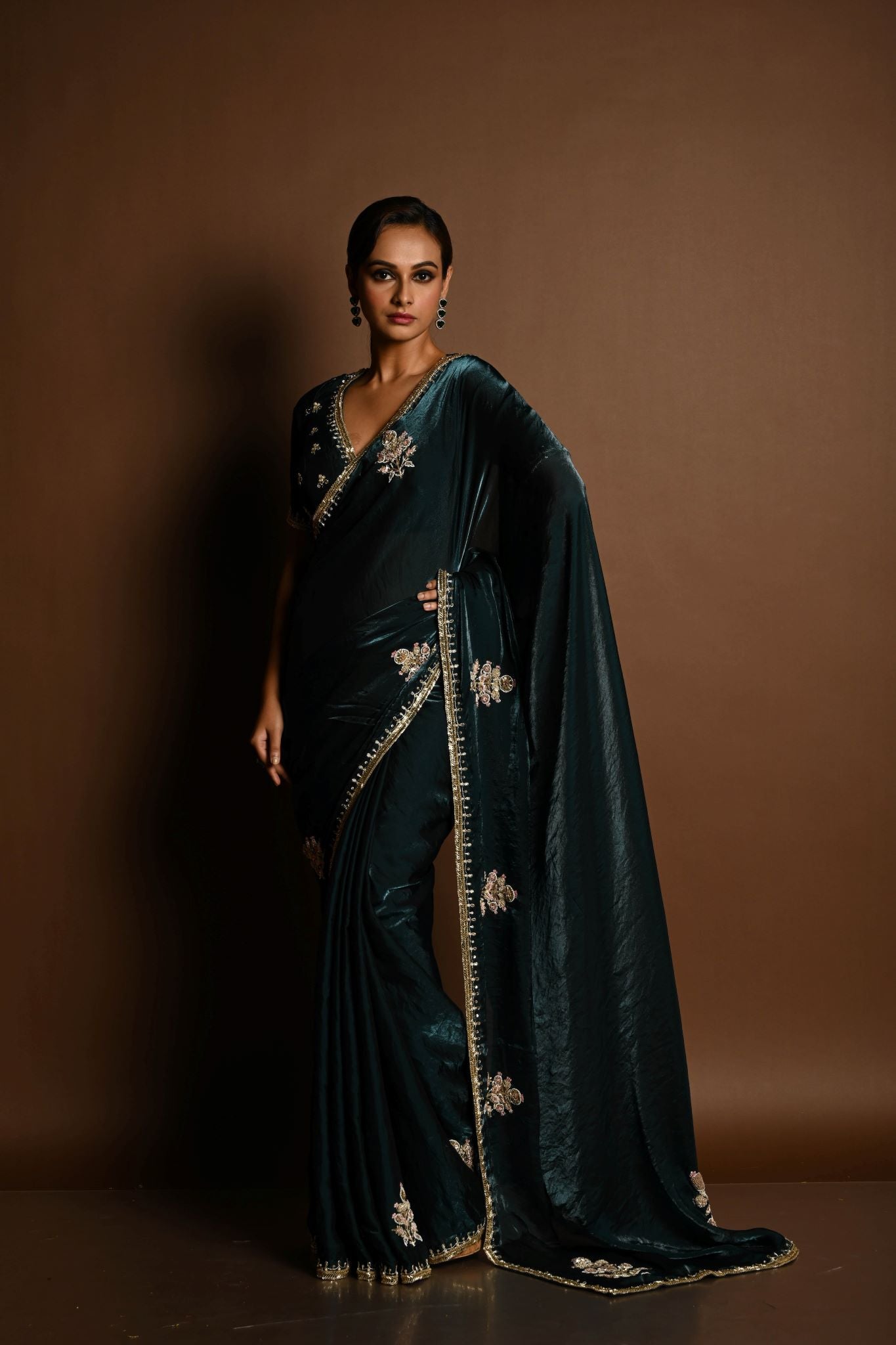 Dark Green Silk Organza Saree with a hand-embroidered finish and matching blouse - Image 1
